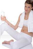 Fitness - Young sportive woman with water and towel