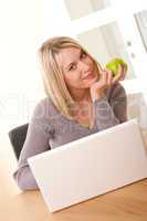 Student series - Young blond woman with laptop