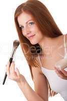 Body care series - Portrait of attractive woman applying powder