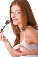 Body care series - Portrait of smiling woman applying powder