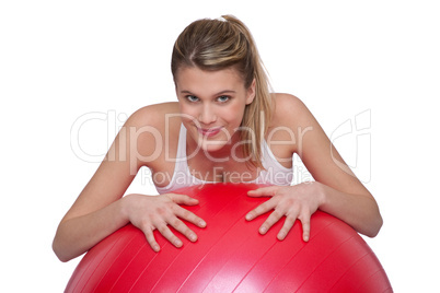 Fitness - Young woman with exercise ball on white