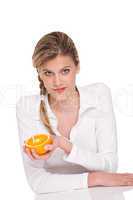 Healthy lifestyle series - Woman holding orange