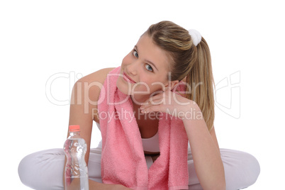 Fitness - Young sportive woman with water and towel