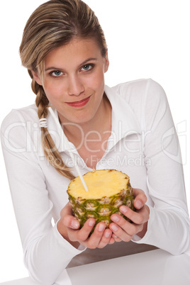 Healthy lifestyle series - Blond woman holding pineapple