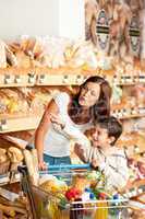 Grocery store shopping - Mother with child