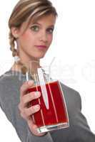 Healthy lifestyle series - Woman holding tomato juice