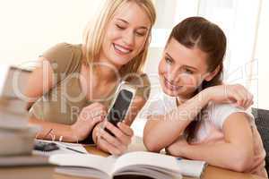 Student series - Two girls watching mobile phone