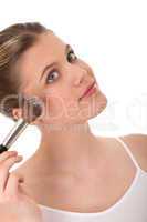 Body care series - beautiful woman doing make-up