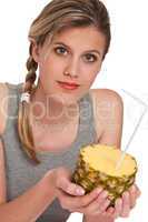 Healthy lifestyle series - Woman holding pineapple