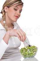 Healthy lifestyle series - Woman with kiwi salad