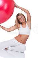 Fitness series - Smiling woman with red ball
