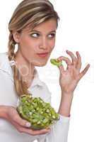 Healthy lifestyle series - Woman holding piece of kiwi