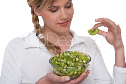Healthy lifestyle series - Woman holding slice of kiwi
