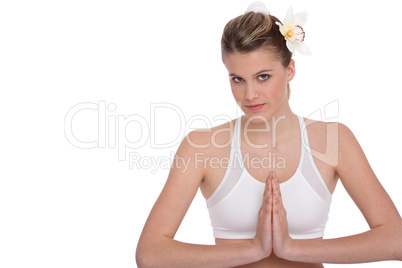 Fitness - Young woman in yoga position on white