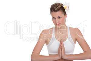 Fitness - Young woman in yoga position on white