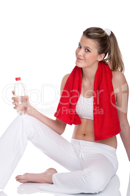 Fitness - Young sportive woman with water and towel