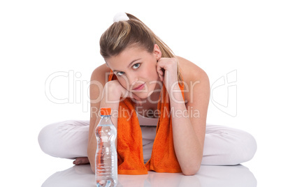 Fitness model with orange towel