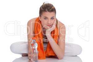 Fitness girl with orange towel