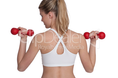 Fitness - Young sportive woman exercise with weights