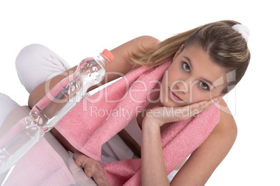 Fitness - Young sportive woman with water and towel