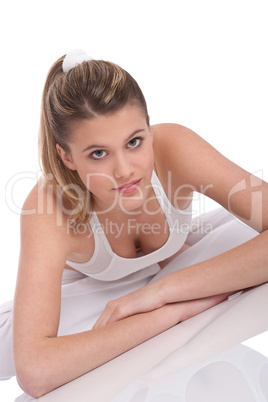 Fitness - young sportive woman on white