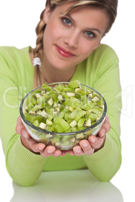 Healthy lifestyle series - Woman holding bowl of kiwi