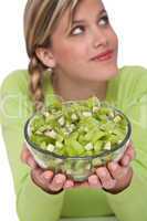 Healthy lifestyle series - Woman holding bowl with kiwi