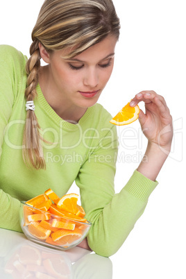 Healthy lifestyle series - Woman eating orange