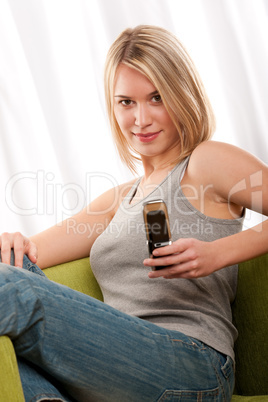 Students series - Blond teenage girl with mobile phone