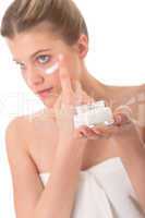 Body care series - woman applying cream