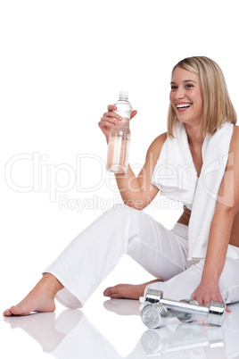 Fitness series - Woman with weights and bottle of water