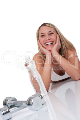 Fitness series - Blond woman with weights and bottle of water