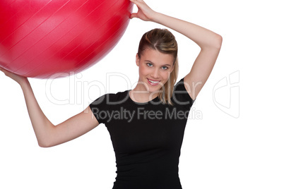Fitness - Young woman with exercise ball on white