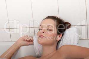 Body care series - Woman lying in the bathtub