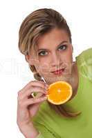 Healthy lifestyle series - Woman with slice of orange