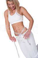 Fitness series - Woman measuring her waist