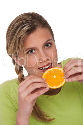 Healthy lifestyle series - Woman biting slice of orange