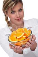 Healthy lifestyle series - Woman holding bowl of oranges