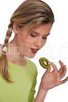 Healthy lifestyle series - Woman holding slice of kiwi