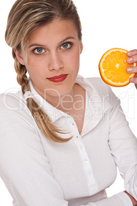 Healthy lifestyle series - Woman holding slice of orange