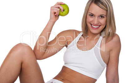 Fitness series - Smiling woman with green apple