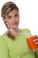 Healthy lifestyle series - Woman holding glass of carrot juice