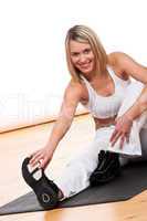 Fitness series - Blond woman exercising on mat