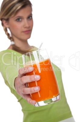 Healthy lifestyle series - Woman holding glass of carrot juice