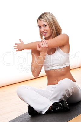 Fitness series - Young woman stretching