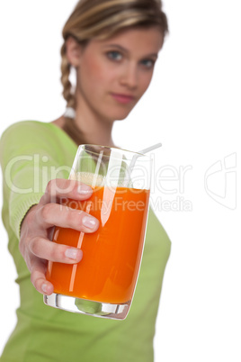 Healthy lifestyle series - Woman holding glass of carrot juice