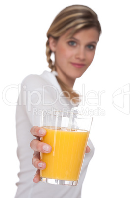 Healthy lifestyle series - Woman holding glass of orange juice