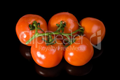 five red tomatoes