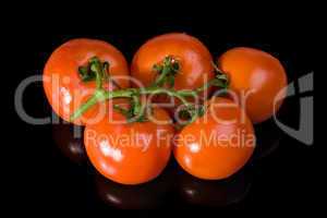five red tomatoes