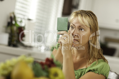 Blonde Woman Applying Her Makeup